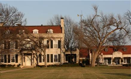Wind turbine overlooking governor's mansion.